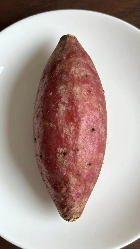 Closeup of a single sweet potato bowl centerpiece on white plate